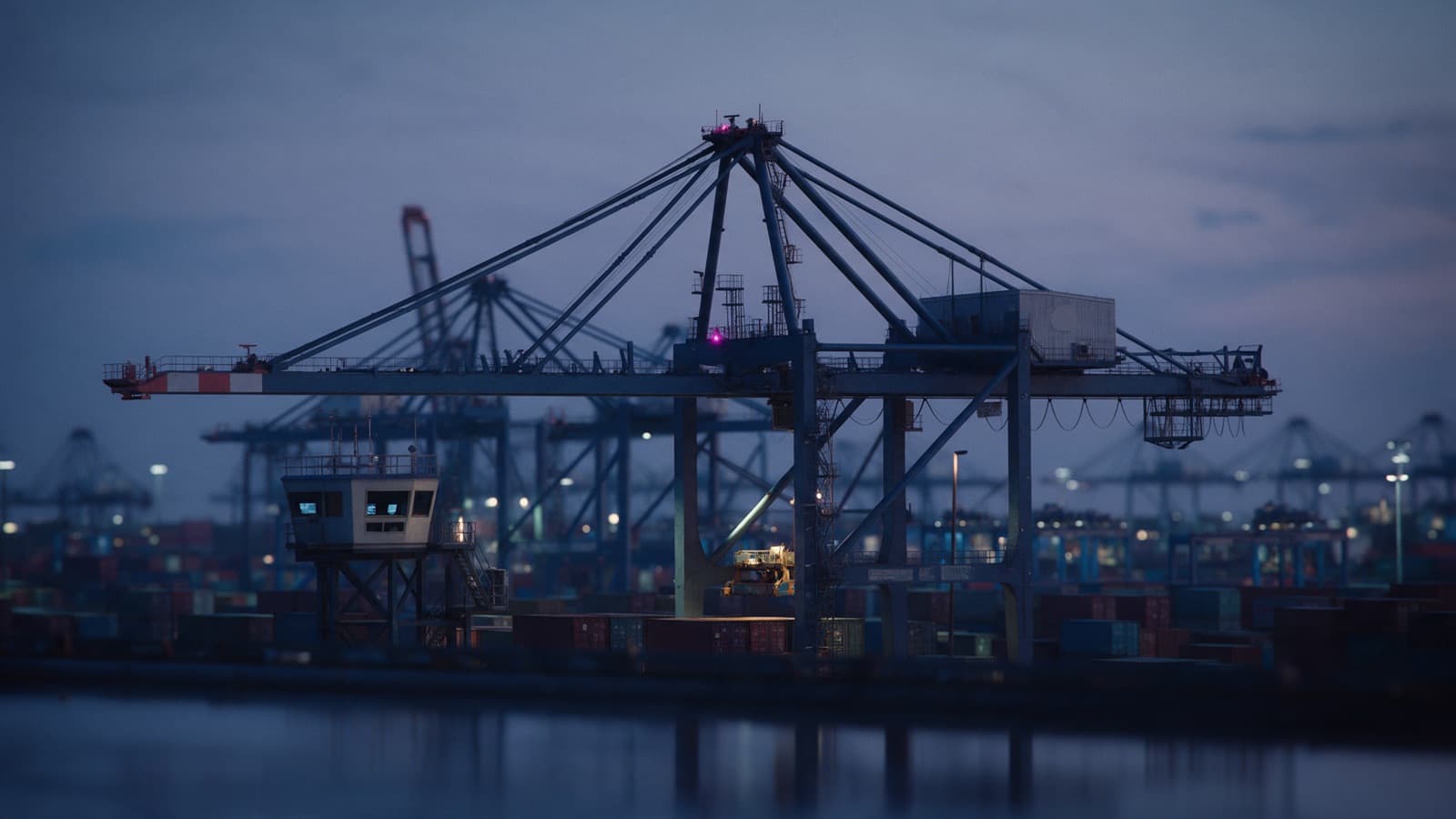 AI-generated illustration: Idle gantry cranes over a container port at dusk